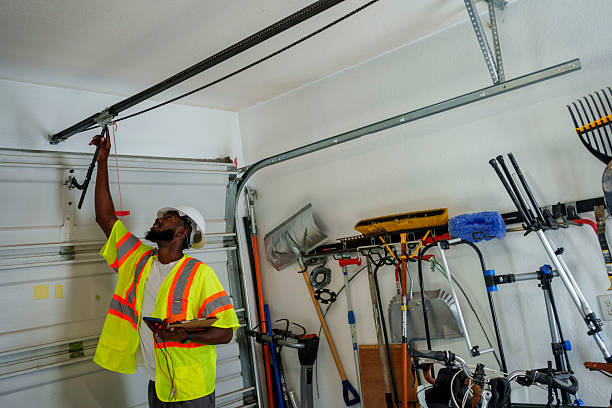 Professional Garage Door Panel Replacement technician working in Old River-Winfree, TX